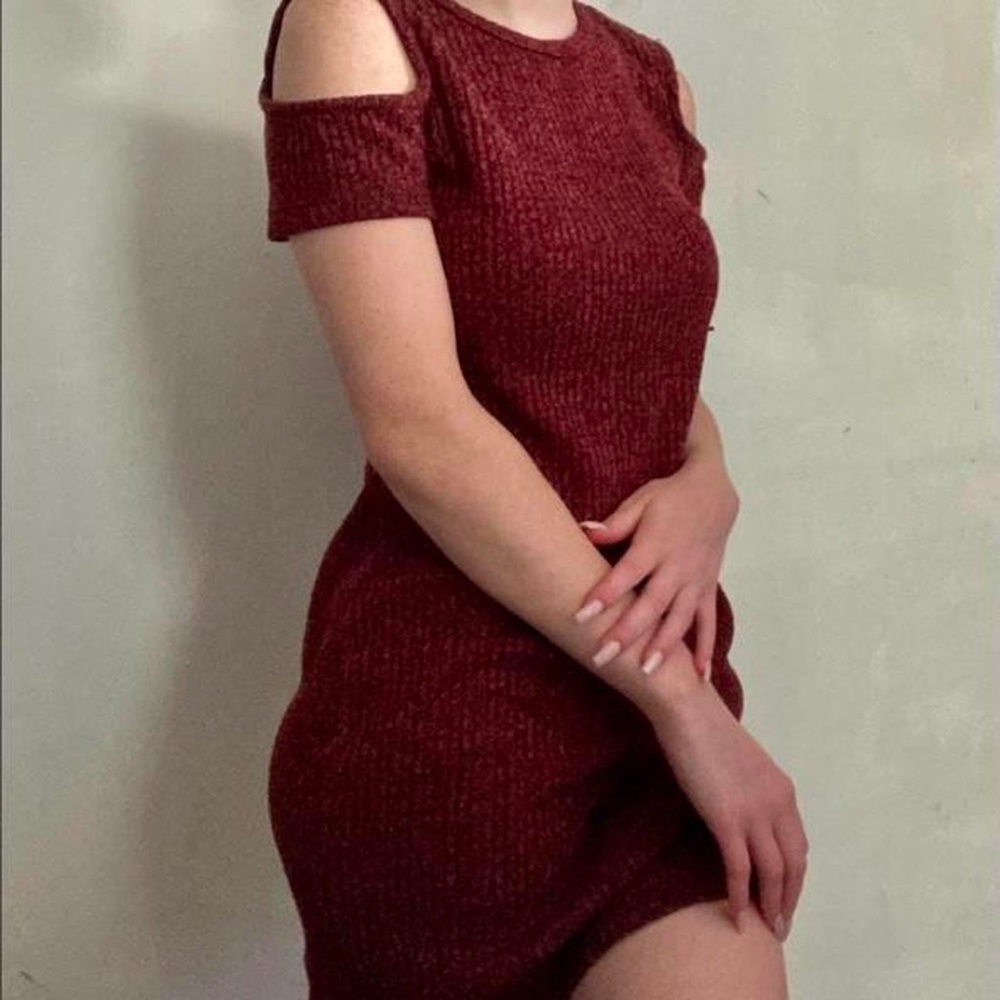 Sweater dress with shoulder cut